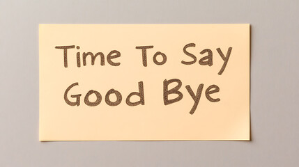 Goodbye message on a yellow sticky note, conveying farewell and parting sentiment. Handwritten message for a leaving event or final communication.