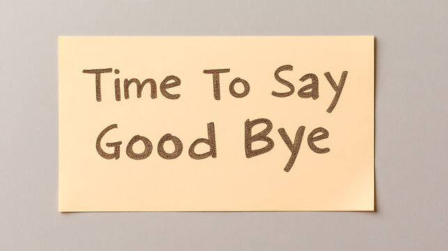 Goodbye message on a yellow sticky note, conveying farewell and parting sentiment. Handwritten message for a leaving event or final communication.