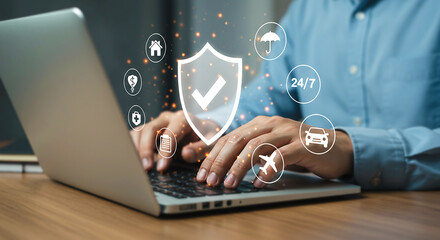 Person Typing on Laptop with Digital Shield Icon – Cybersecurity and Online Protection Concept