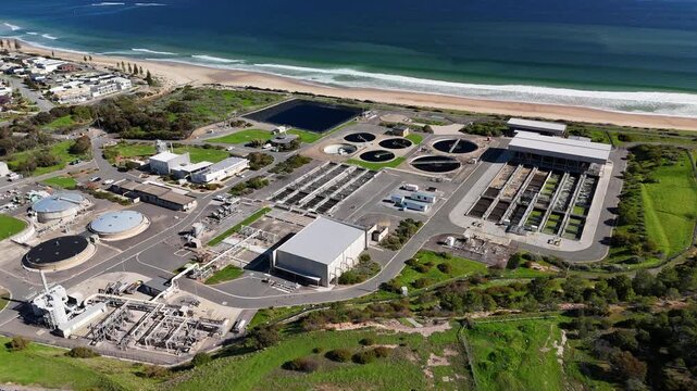 SA Water Christies Beach Wastewater Treatment Plant, O'Sullivan Beach, South Australia: 4K Aerial Drone Footage of Coastal Facility, Clarifier Tanks, Infrastructure, Solar Panels, and Nearby Beach