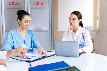 Team of doctor and nurse is discussing and brainstorming on patient medical record after diagnosis...