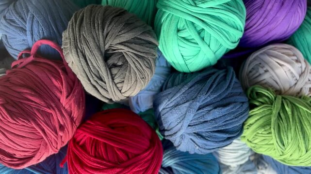 Colorful recycled fabric yarn balls, also known as trapillo or totora thread. Made from upcycled textiles, ideal for eco-friendly crafts, , and DIY projects

