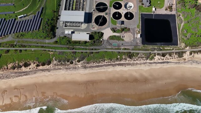 SA Water Christies Beach Wastewater Treatment Plant, O'Sullivan Beach, South Australia: 4K Aerial Drone Footage of Coastal Facility, Clarifier Tanks, Infrastructure, Solar Panels, and Nearby Beach