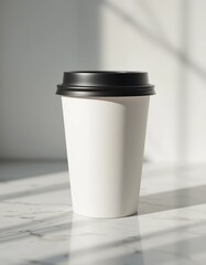Minimalist Coffee Cup on Sunlit Marble Surface for Lifestyle and Design Concepts.
