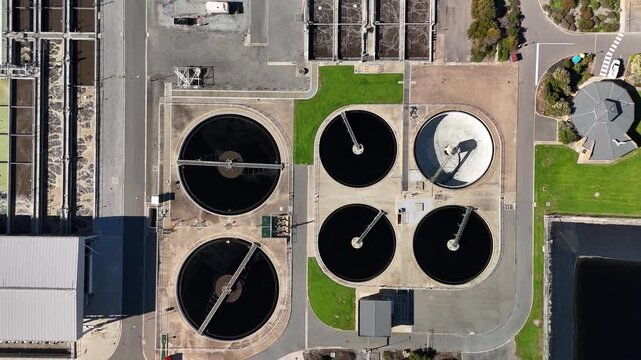 SA Water Christies Beach Wastewater Treatment Plant, O'Sullivan Beach, South Australia: 4K Aerial Drone Footage of Coastal Facility, Clarifier Tanks, Infrastructure, Solar Panels, and Nearby Beach