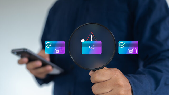 A man holding a magnifying glass to inspect a digital wallet with a warning icon. Concept of mobile payment fraud detection, transaction error, and cybersecurity in fintech.