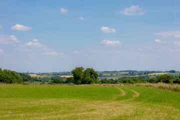 Summer landscape, The terrain of Schaesberg (mountain) with a small town villages and houses on hillside, A hamlet in the Dutch province of Zuid-Limburg, Valkenburg aan de Geul and region, Netherlands