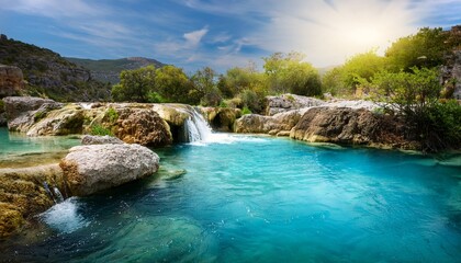 Naklejka premium azure springs flowing through a stone landscape