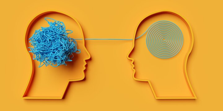 Two head shapes with tangled and ordered strings on yellow background, mental disease or disorder, psychology concept