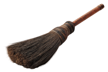 Antique-looking whisk broom with wooden handle.  Dark brown bristles and a slightly worn appearance.  Simple, functional design