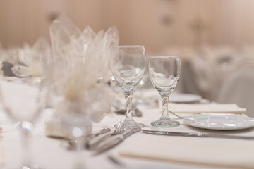 Elegant table setting for a memorable celebration in a cozy event space during the evening's festivities