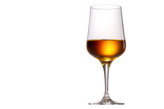 Glass of amber liquid, possibly sherry or whiskey.