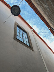 Romantic backstreet, side street or alley in historic old town of Porto Oporto, Portugal with...