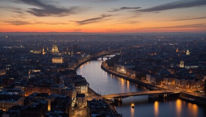 Fototapeta premium Paris cityscape at sunset with Seine River illuminated by numerous lights. Iconic landmarks of Musee dOrsay, Palace of Versailles visible. Orange hues in sky. City bathed in warm glow of setting sun.