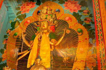 Many faced Goutama Buddha, symbol of multiple aspects of Buddhahood, the different bodies of a...