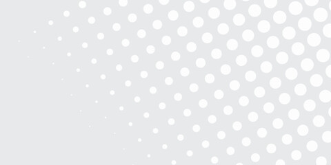 Abstract Grey and White Polka Dot Pattern with Gradual Density.