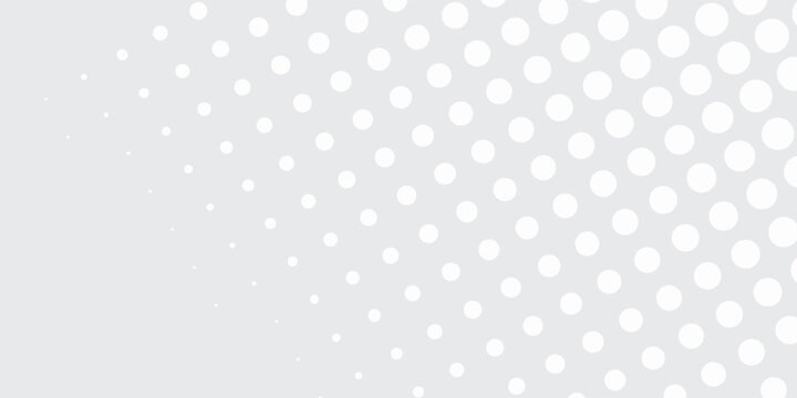 Abstract Grey and White Polka Dot Pattern with Gradual Density.