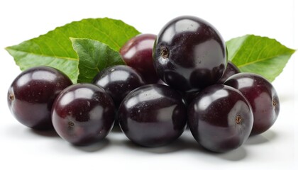 Fototapeta premium Dark purple grapes in loose cluster on beige surface. Grapes spread out, overlapping, lying flat. Single green leaf adds vibrancy on side. Fruit isolated on white background, summer food, nature