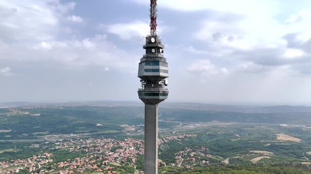 Drone orbit around Avala Tower in Serbia with panoramic landscape