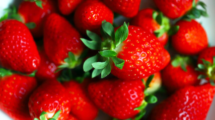 Fresh ripe strawberries in a plate.