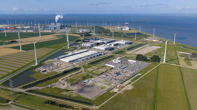 massive data center, computing center, aerial video in the Eemshaven, The Netherlands. - Powered by Adobe