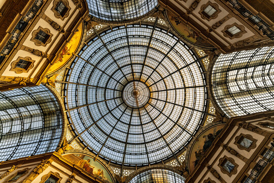 Glass dome ceiling of Galleria Vittorio Emanuele II in Milan - Powered by Adobe