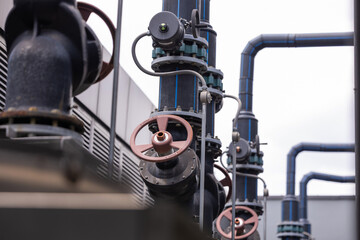 Obraz premium Water is Life for African Children. steel water piping structure in nature. Steel long pipes in crude oil factory. Natural gas pipeline.