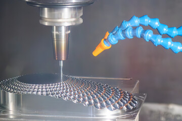 The CNC milling machine finish cut the mold parts by solid ball nose end mill tool.