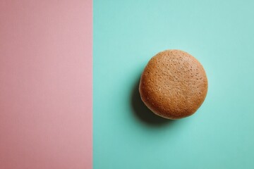Round Bun On Pastel Background