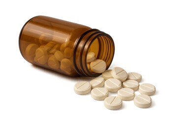 White pills spilling from a brown medicine bottle on a transparent background