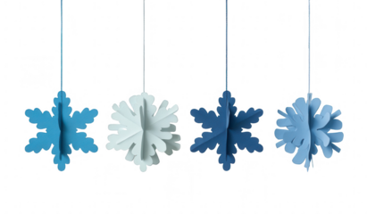 Four paper snowflakes, varying shades of blue and white, hang from strings