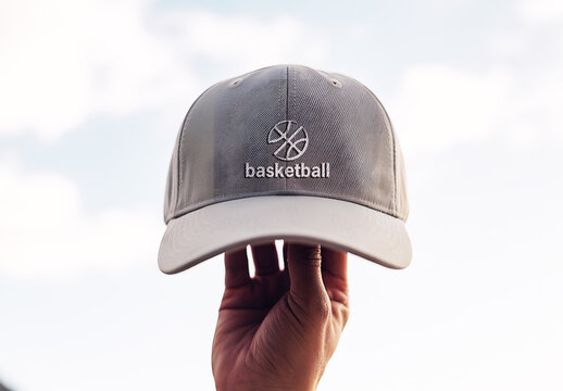 Realistic Baseball Cap Mockup Held Against Sky