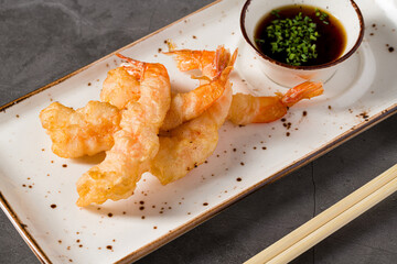Crispy shrimp tempura served with soy dipping sauce