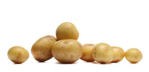 Pile of potatoes isolated on white, side view
