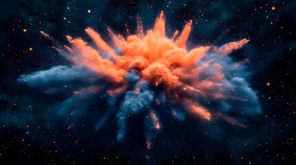 Vibrant explosion of orange and blue colored powder in space.