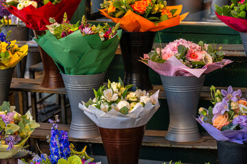 Colorful flower bouquets at outdoor market
