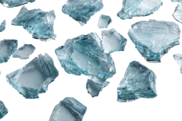 Scattered, light teal-blue, shard-like fragments against a dark background