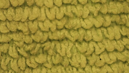 Obraz premium Macro shot detail image of a green wool sweater