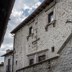 picturesque marble framed windows at historical hilltop little village, Santo Stefano di Sessanio, Italy