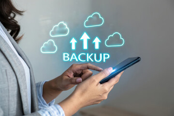 Woman using smartphone for cloud data backup and storage
