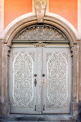 Old ornamental entrance door to a house in Poland