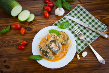 Homemade warm dish of zucchini with herbs