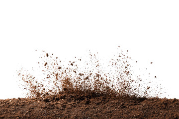 A close-up view of a dirt splash.  A mound of brown earth with a vibrant, splashy eruption of particles