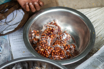 Selling street food packaged in paper