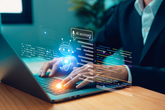 AI assistant. Businessman using laptop with interface and chatbot technology. Concept of artificial intelligence, machine learning, digital innovation, and productivity tools in modern business.