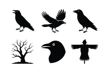 Obraz premium Black crow silhouettes flying perched and a scarecrow with a bare tree raven bird