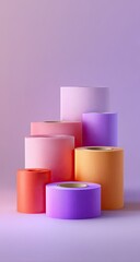 Stacked colorful cylindrical forms on a pastel purple background.  Various shades of pink, orange, and purple tubes/rolls create a tiered display.  Soft lighting emphasizes the forms