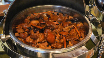 Cooking pot of meat and vegetables for a delicious meal