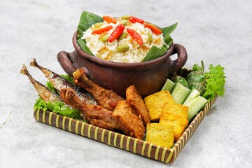 Nasi Liwet Sunda. Sundanese liwet rice is a rice dish cooked in a special way using various spices...
