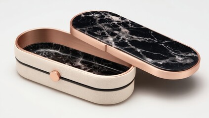 Open oval box, black and white marble top, cream interior, rose gold accents